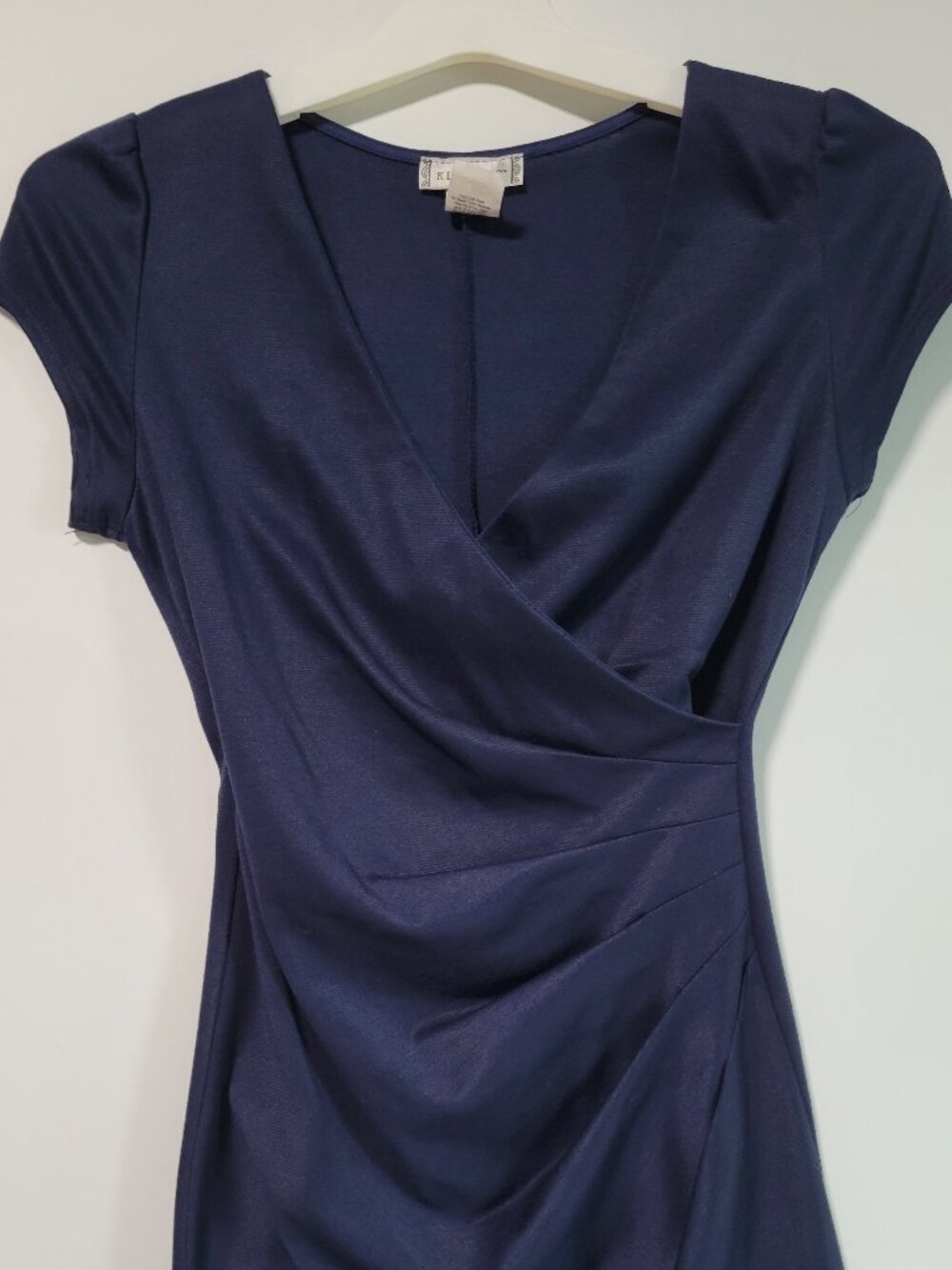 Navy blue ruched faux wrap sheath dress